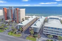 Ride the Tide at Beachside Manor!  2Bd, 1B with Free Parking! Steps to the Sand!