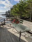 Enjoy the stunning views while relaxing on the deck at East Ledge Cottage