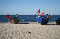 Beachfront apartment with sea views, beach chair by the sea, parking at the house