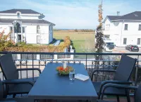 Apartment beach life. 2 bedrooms, high quality furnishings, great sea views! Hotels in Börgerende-Rethwisch