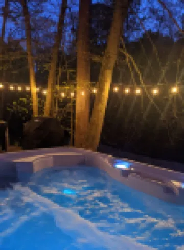 Custom Design Safari Tent Overlooking a Serene Running Creek & Natural Waterfall