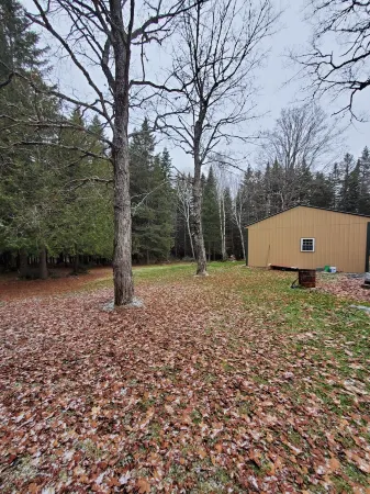Secluded camp off the snowmobile trail