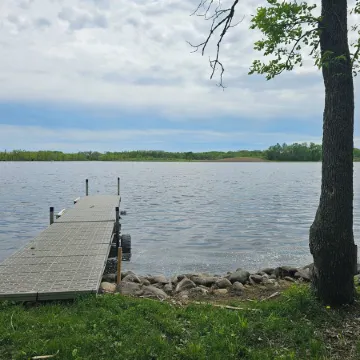 Relax in 3 bed, 2 bath house on quiet 2 acres with private lake.