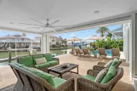 Heated Pool, Hot Tub, Kayaks, Fishing, 5BR Waterfront Home in Key Allegro - 4-نجوم