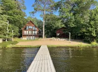 Sleeps 22! PRIVATE Secluded Beach Lake Home on Eagle River Chain of Lakes!