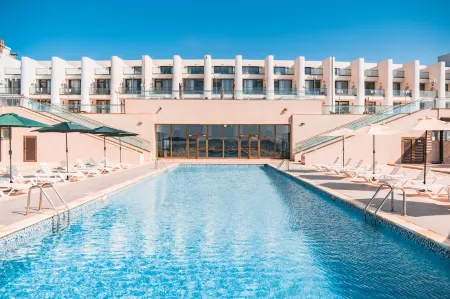 Les Sables d'Or Отели рядом с достопримечательностью «Palm beach resort»