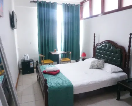 Happy Ours Guesthouse โรงแรมในกูร์ปีป
