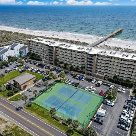 Upper Unit Overlooking the Beautiful Outdoor Space and Pier