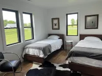 Eagles Crossing is a Newly Renovated 3-Bed Farmhouse with a Large Deck & Hot Tub