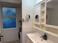 Dog friendly apartment close to beaches. Own private yard, garden and 2 decks.