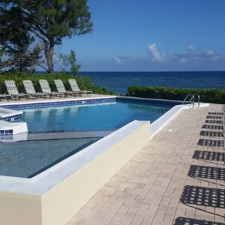 Steps to Sand & Sea - Oceanfront Condo with Pool in Quiet Cayman Kai/Rum Point