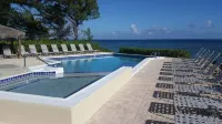Steps to Sand & Sea - Oceanfront Condo with Pool in Quiet Cayman Kai/Rum Point