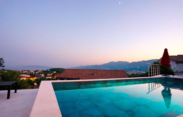 Exclusive vacation apartment near Opatija with 180° sea view and private pool.