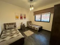 Entire modern villa with pool and outdoor living by Sama Petra Отели в г. Al Ardha Sub-District