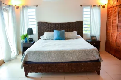 Spectacular home - 5 mins walk to beach, modern, comfortable, clean and spacious Hotels near Rendezvous Bay Beach