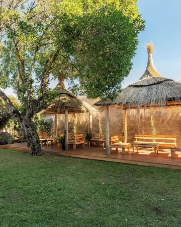 Las Golondrinas Отели рядом с достопримечательностью «Punta Mogotes»