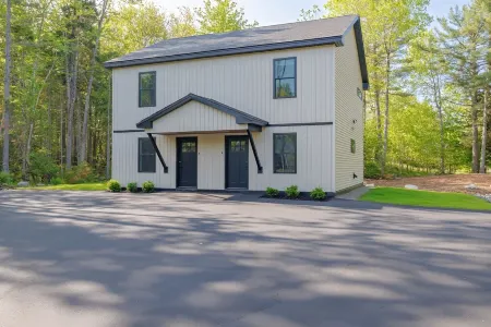 Serene 2-bedroom apartment with WiFi in Ellsworth with a backyard stream.