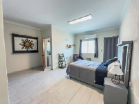 Spacious 5-bedroom house with AC, WiFi near to the beach