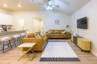 Four beds w/ 1 king, 3 queen beds each with a TV. Centrally located! No pets