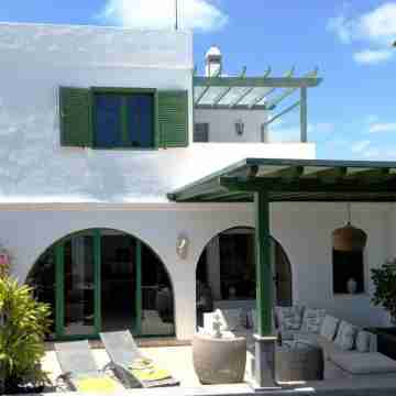 Villa feet in the water, really! Hotel Exterior