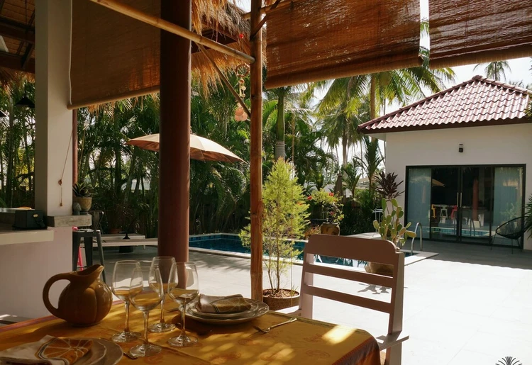 รูปภาพของVilla Manni: the Art of Outdoor Living Amid Coconut Palms.