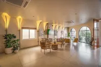 Aura Inn & Suites