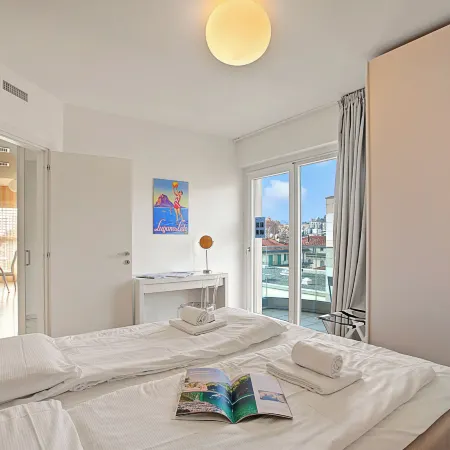 Attico Al Parco: Penthouse in Lugano | Balcony, A/C & 2 Min from Lake - Happy Rentals