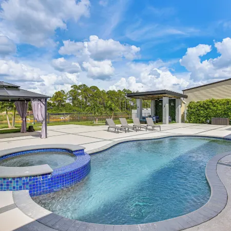 Outdoor Oasis! Luxe Waterfront Gem in Lehigh Acres