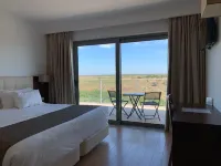 Hotel O Gato & Spa Отели в г. 