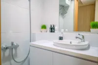 Spacious 2BR Combined Tokyo Riverside PIK 2 Apartment By Travelio