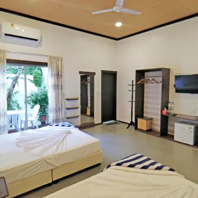 Thoddoo Inn Hotels near Thoddu Beach