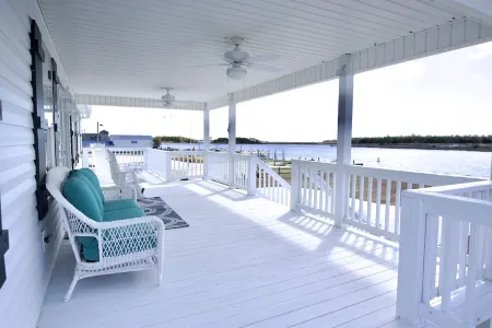 Enjoy a 3-bedroom waterfront vacation home just 10 minutes from Emerald Isle