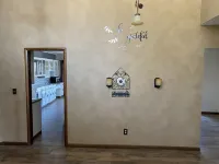 3,900 sq ft house with a big deck and a great view of the hills and canyon lake
