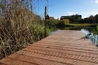 Fewo EG am Fluss mit Terrasse - Eine Grüne Oase