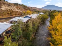 Centrally Located Luxury Home right on Rock Creek perfect for Large Groups
