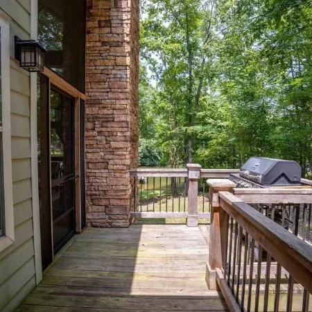 Breathtaking porch just steps from the water.