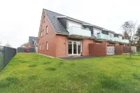 Bright, modern ground floor apartment for 4 people including four-legged friends Hotels near Norden Altstadt