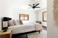 Centrally located cozy cottage tucked into the woods, a perfect family retreat