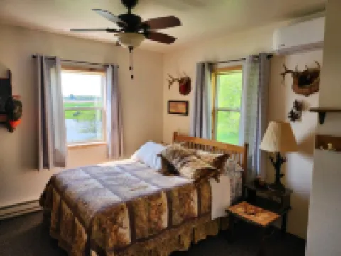 Peacefully secluded cabin on a small private lake with 55 Acres