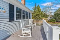 Walk to beach, fenced yard, and toys for the kids!