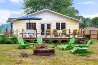 Lake front home with access to two lakes, large yard and RV hookup available!