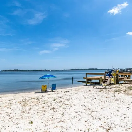 Quaint waterfront home with private beach