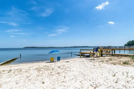 Quaint waterfront home with private beach