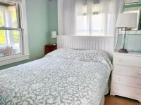 Beachfront cute cottage on Private  Beach. Best View on the Cape.  on high bluff