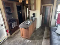 Cozy RV tucked back in a quiet property with plenty of room to relax