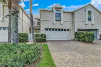 Oceanfront, gated community townhome with private W/D, beach & pool access