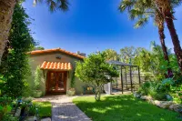 Heated Saltwater Pool and Lush Landscaping - Charming Modern Retreat