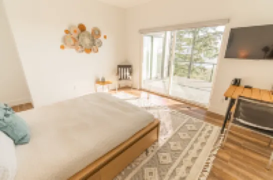 Stunning Bay Views and Cozy Amenities - Modern Coastal Getaway