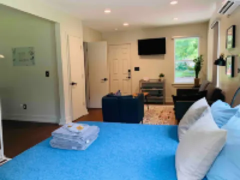 Relaxing Backyard and Cozy Seating Area - Charming Urban Haven