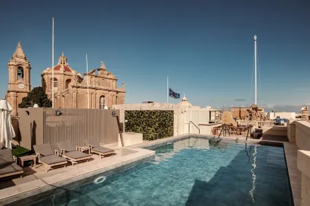 Palazzo Castagna Отели в г. Марсашлокк